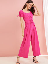 Load image into Gallery viewer, Neon Pink Lace Up Sweetheart Neck Wide Leg Jumpsuit