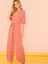 Load image into Gallery viewer, Trumpet Sleeve Plunging Neck Belted Jumpsuit