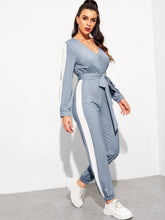 Load image into Gallery viewer, Surplice Neck Self Belted Colorblock Jumpsuit