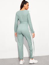 Load image into Gallery viewer, Surplice Neck Self Belted Colorblock Jumpsuit