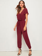 Load image into Gallery viewer, Solid Surplice Neck Drawstring Waist Jumpsuit