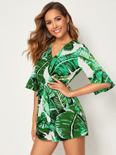 Load image into Gallery viewer, Tropical Print Surplice Neck Belted Blouson Romper