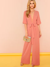 Load image into Gallery viewer, Trumpet Sleeve Plunging Neck Belted Jumpsuit