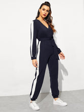 Load image into Gallery viewer, Surplice Neck Self Belted Colorblock Jumpsuit