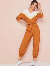 Load image into Gallery viewer, Cut And Sew Belted Jumpsuit